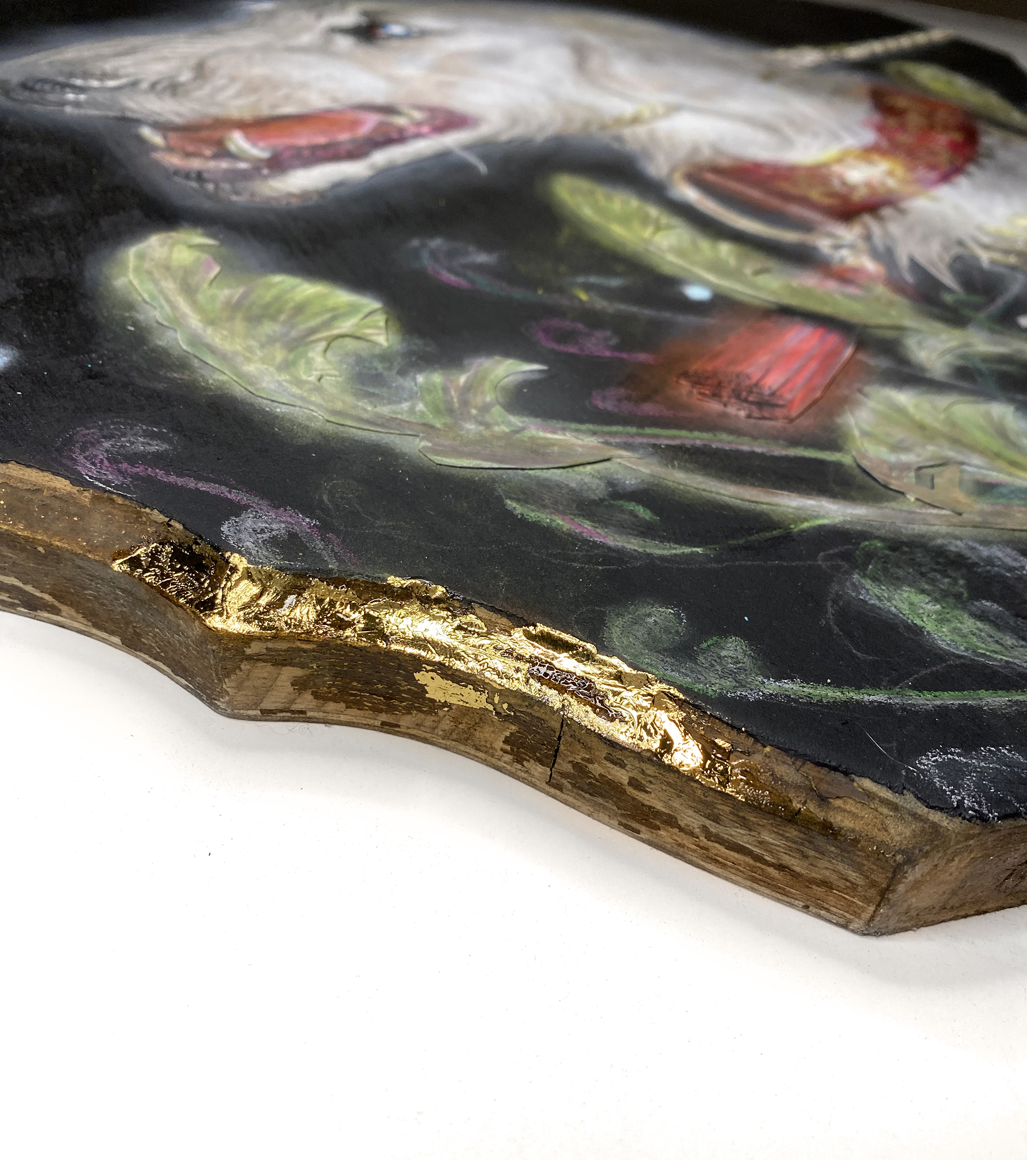 side view of a fantasy borzoi adorned in shining gold caught in a cameras bright flash while standing in tall grass. painting on a Quatrefoil found object.