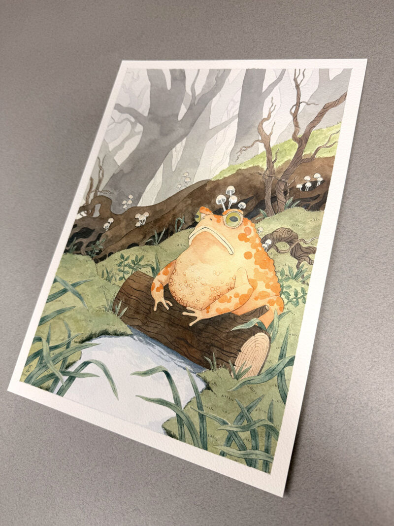 Side view of original artwork, photographed on neutral background with warm light