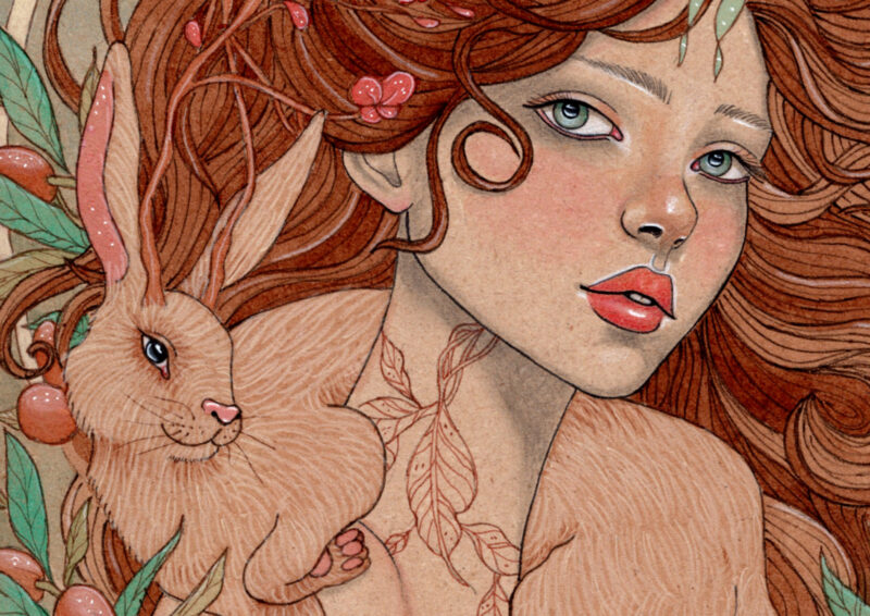 Tan hare around the shoulders of a brunette woman