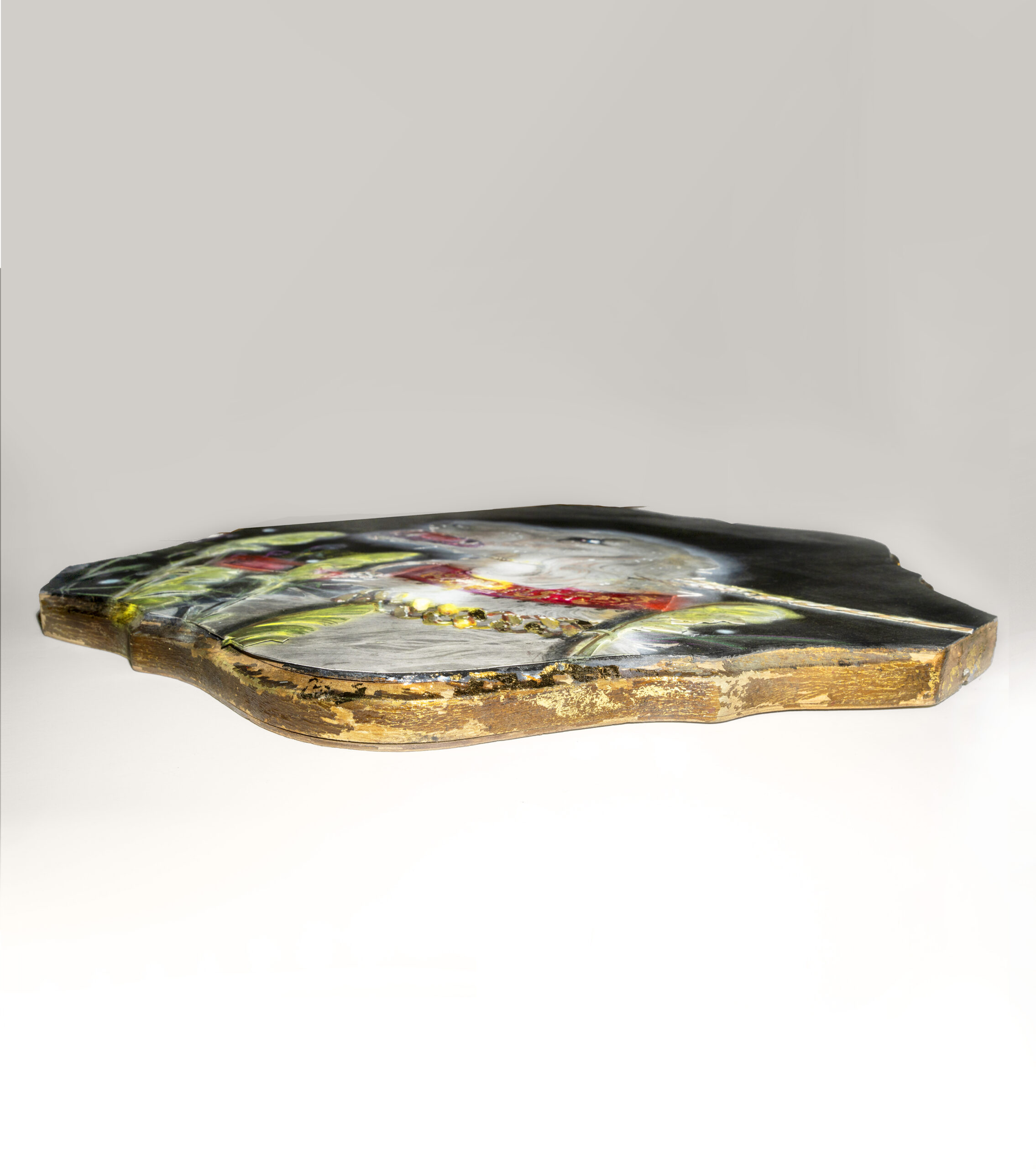 side view of a fantasy borzoi adorned in shining gold is caught in a cameras bright flash while standing in tall grass. painting on a Quatrefoil found object.