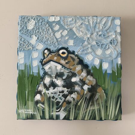 "Toad in the Grass" painting displayed on the wall.