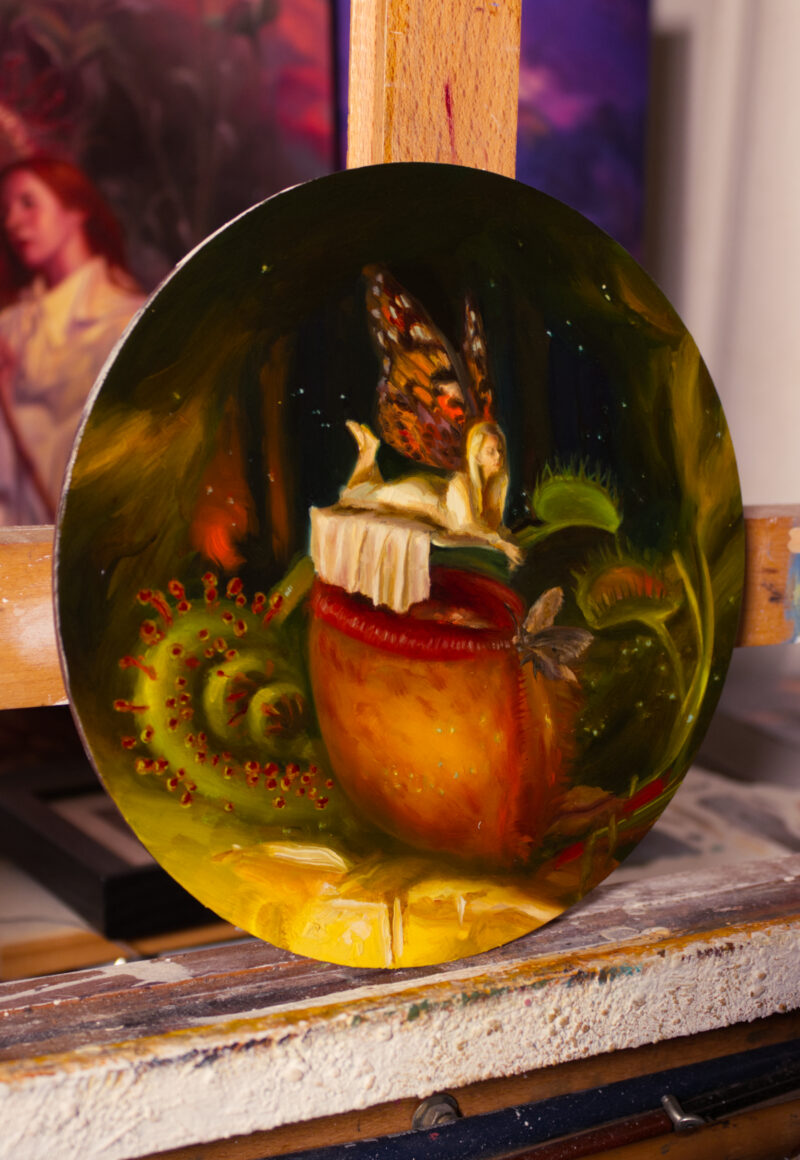 Angled view of an oil painting featuring a fairy resting above a pitcher plant leaf. A moth sits on the edge of its opening. Surrounding the focus of the painting is two Venus fly traps, and a coiled sundew.