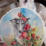 watercolor painting of a silvery silken windhound in an abstracted field of roses