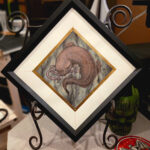 Original art of an Eastern Hellbender, eating nightcrawlers