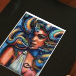 A portrait of Medusa with colorful snakes. Miniature painting.