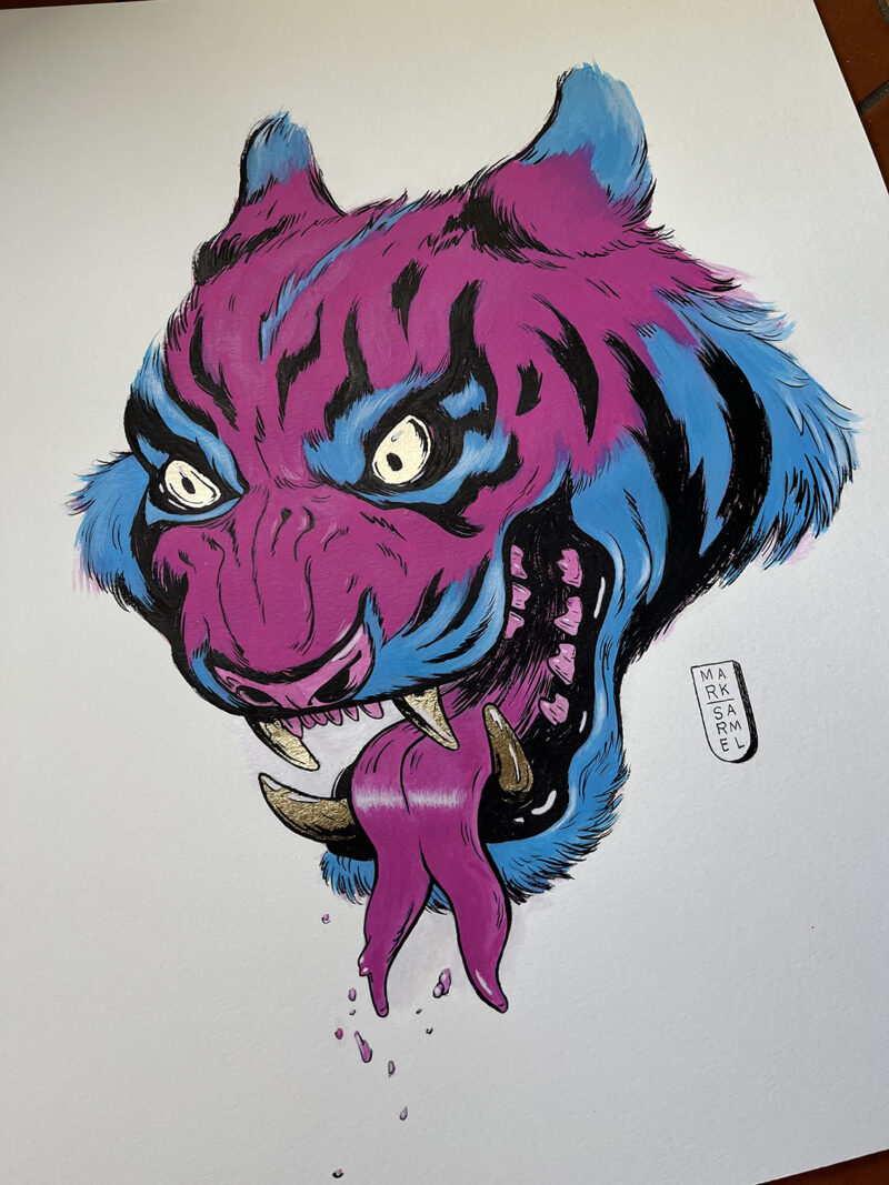 A close up detail image of a pink and blue two tongued tiger with gold leaf for its eyes and teeth