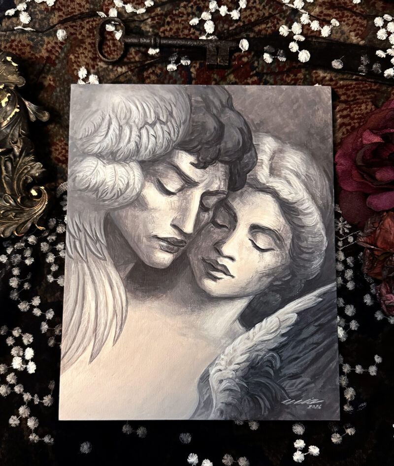 Statue Lovers painting surrounded by vintage fabric, flowers, and a frame in my studio