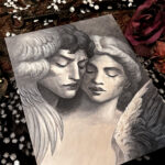 Tilted studio shot of Statue Lovers painting, surrounded by fabric, flowers, frame.