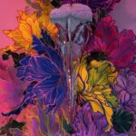 A hand-sculpted silver filigree bird skull nestled in a riot of colourful 3d flowers, hand-stitched to the frame