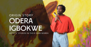 origin story for odera igbokwe. odera striking a pose in a flowing white shirt, a big yellow painting of a black woman behind him.