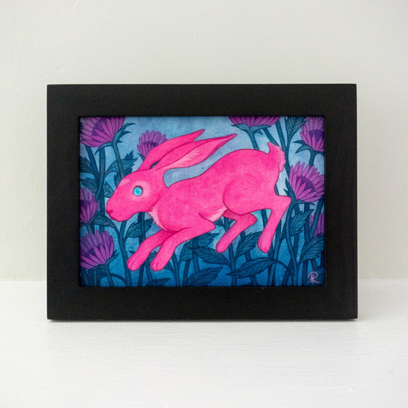 A framed painting of a pink hare surrounded by purple bee balm bergamot flowers.