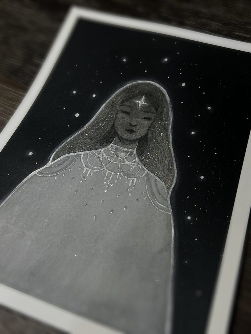 A painting of a feminine figure in white clothing, a star on her forehead, and silver and glittery details. The figure is placed against a dark background with stars.