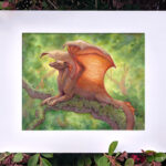 "Basking Warmth" with a white mat, against a leafy backdrop
