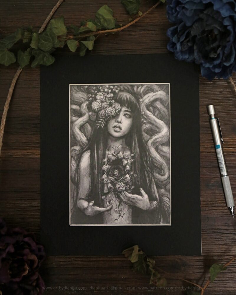 Graphite drawing of a female representing figure with marigolds coming out of one of her eyes. Long dark hair. Chest open, edges look like bark. A marigold comes out of the space. Tree branches at her back.