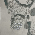 Another close up of Mak's right horn decorated with pom poms and various other ephemera.