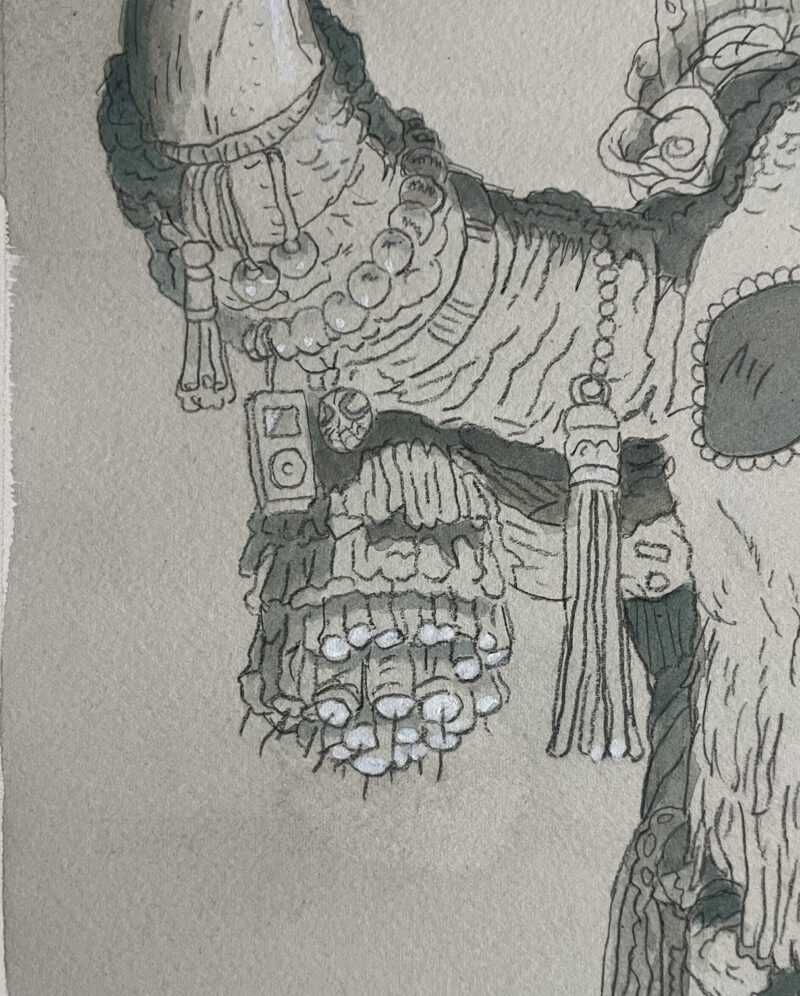 Another close up of Mak's right horn decorated with pom poms and various other ephemera.