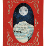 hand cut altered book with moon and rose