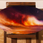 ‘Pax Exitiosa’, a tondo oil painting on a pochade. Includes an image of a cloud of smoke and fire on a beach.